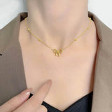 Jitka Bow Necklace Gold