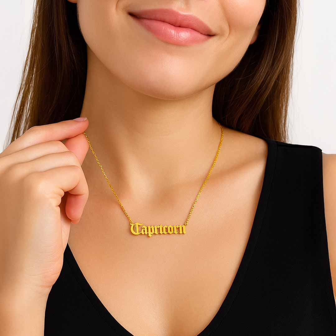 Goldene Halskette mit Sternzeichen-Namen